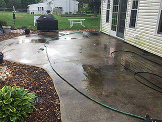 Before and after GIF of a manalapan pressure washing of a patio